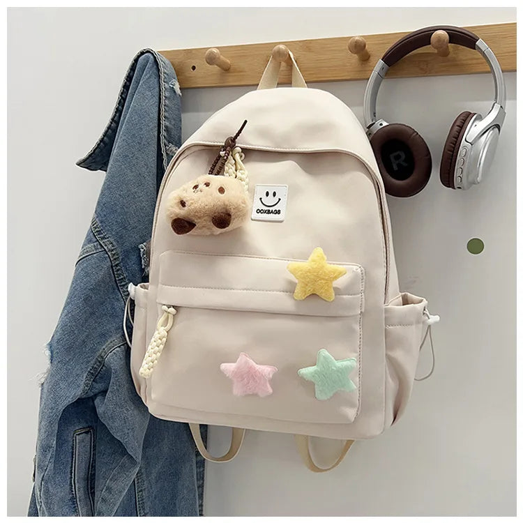 Zaino da donna in nylon di marca con ciondolo in peluche casual Borsa da viaggio per borsa da scuola a secchiello di grande capacità