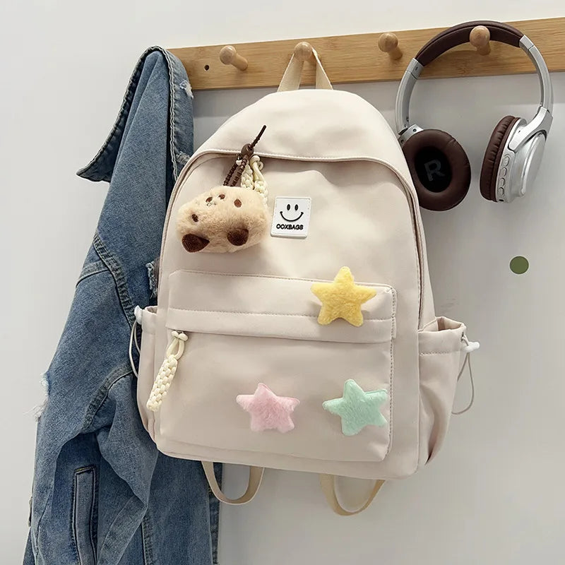Zaino da donna in nylon di marca con ciondolo in peluche casual Borsa da viaggio per borsa da scuola a secchiello di grande capacità