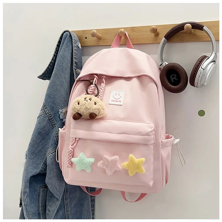 Zaino da donna in nylon di marca con ciondolo in peluche casual Borsa da viaggio per borsa da scuola a secchiello di grande capacità