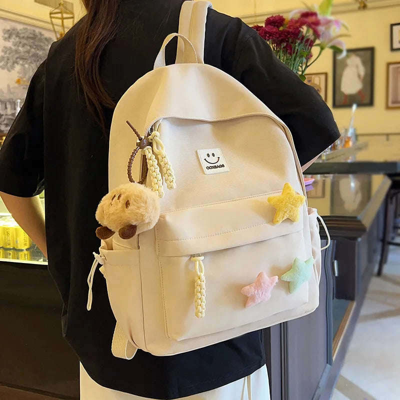 Zaino da donna in nylon di marca con ciondolo in peluche casual Borsa da viaggio per borsa da scuola a secchiello di grande capacità