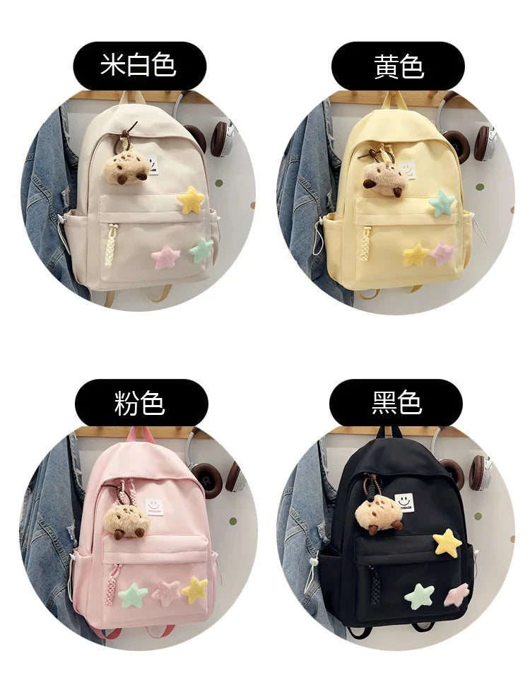 Zaino da donna in nylon di marca con ciondolo in peluche casual Borsa da viaggio per borsa da scuola a secchiello di grande capacità