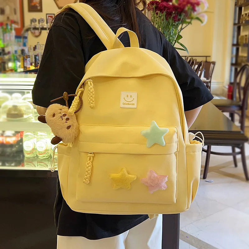 Zaino da donna in nylon di marca con ciondolo in peluche casual Borsa da viaggio per borsa da scuola a secchiello di grande capacità