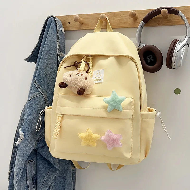 Zaino da donna in nylon di marca con ciondolo in peluche casual Borsa da viaggio per borsa da scuola a secchiello di grande capacità