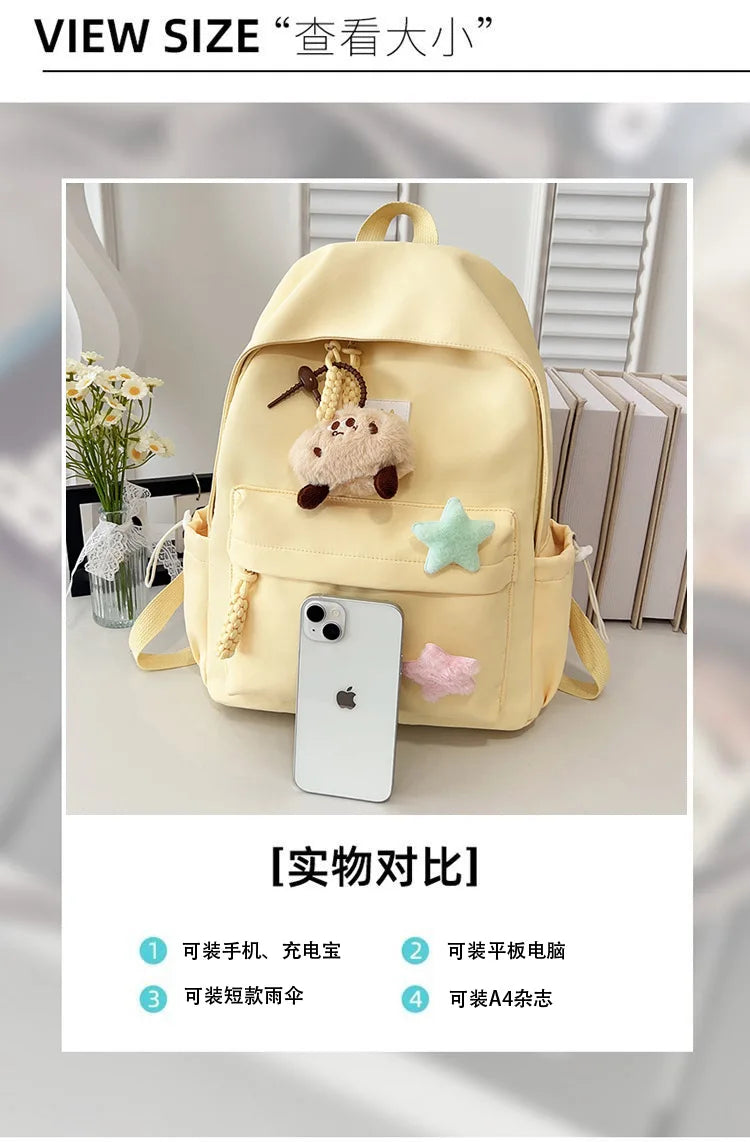 Zaino da donna in nylon di marca con ciondolo in peluche casual Borsa da viaggio per borsa da scuola a secchiello di grande capacità