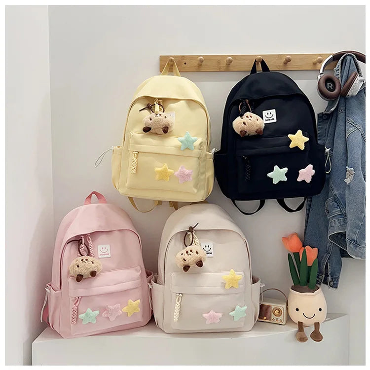 Zaino da donna in nylon di marca con ciondolo in peluche casual Borsa da viaggio per borsa da scuola a secchiello di grande capacità