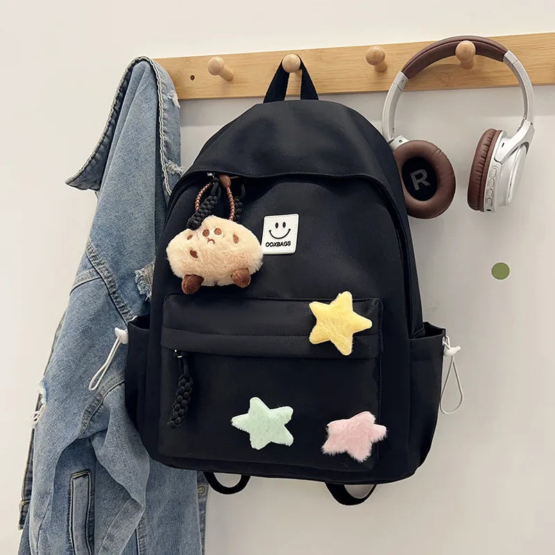 Zaino da donna in nylon di marca con ciondolo in peluche casual Borsa da viaggio per borsa da scuola a secchiello di grande capacità