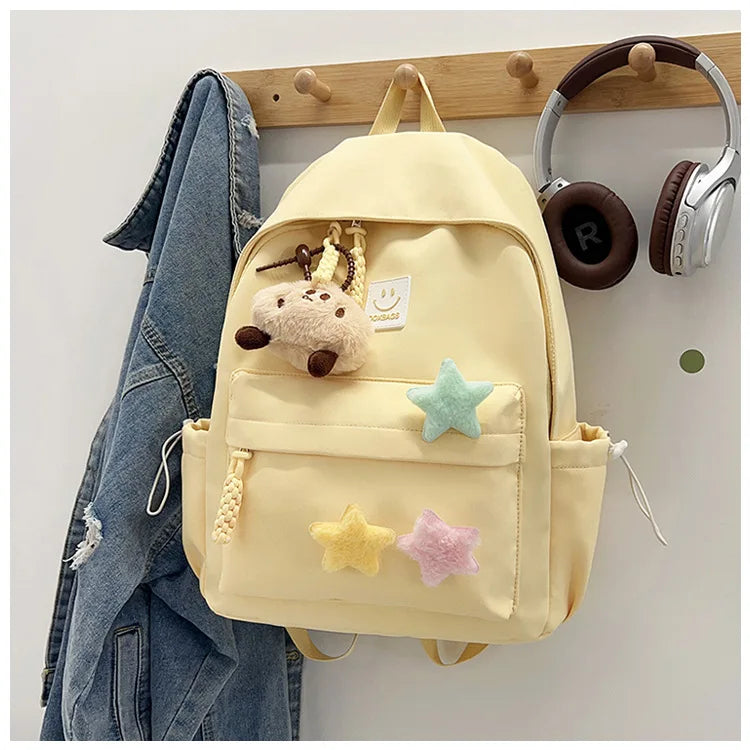 Zaino da donna in nylon di marca con ciondolo in peluche casual Borsa da viaggio per borsa da scuola a secchiello di grande capacità